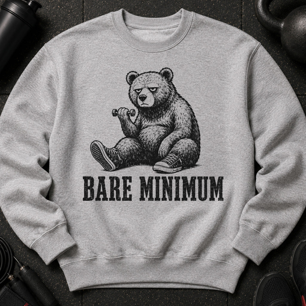 Grey sweatshirt featuring a bear sitting with a dumbbell and the text "BARE MINIMUM".