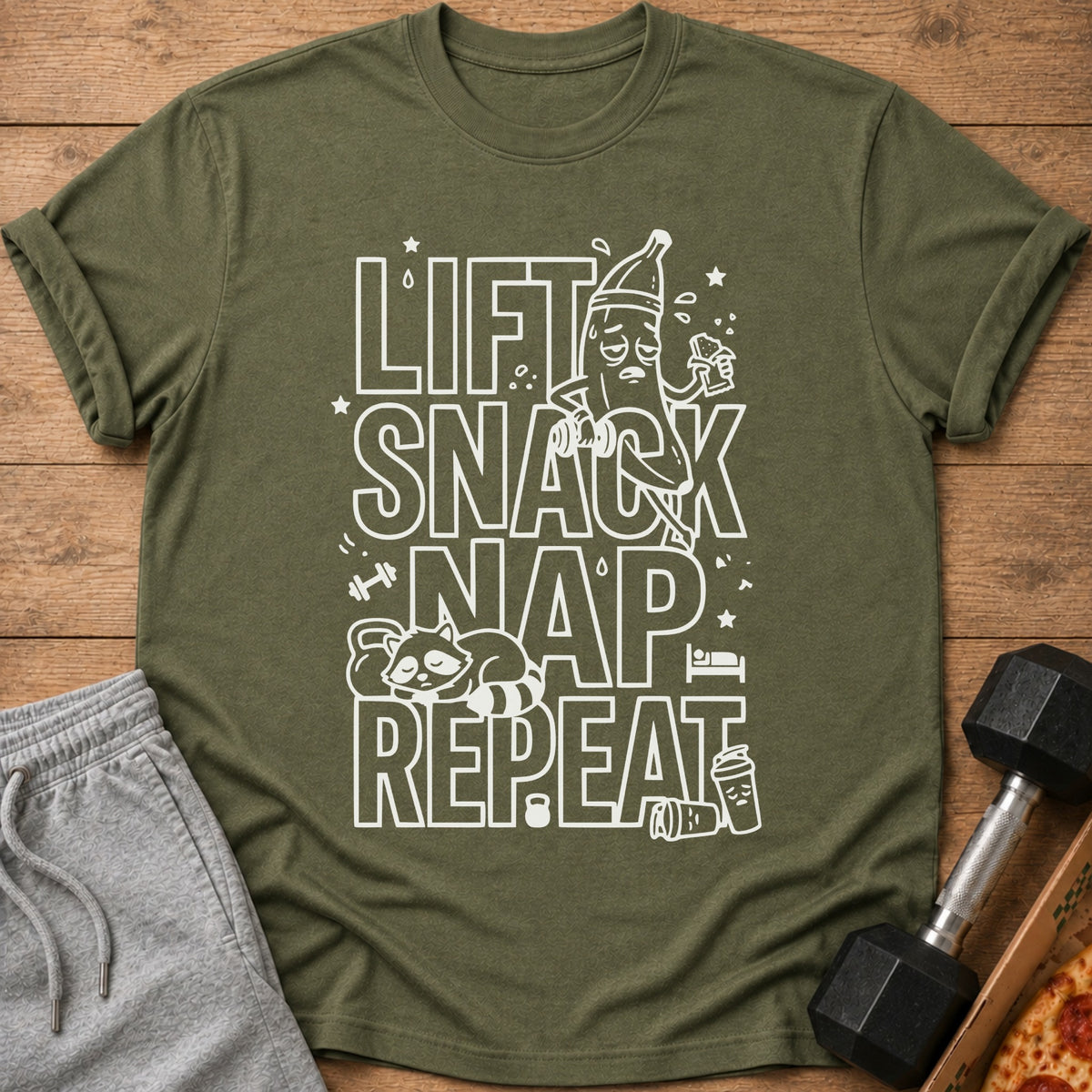 Olive t-shirt with "Lift Snack Nap Repeat" text and cartoon graphics.