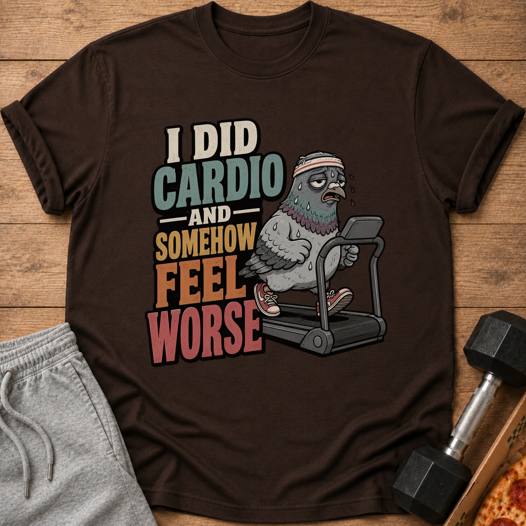 T-shirt with cartoon pigeon running on treadmill, text "I DID CARDIO AND SOMEHOW FEEL WORSE"