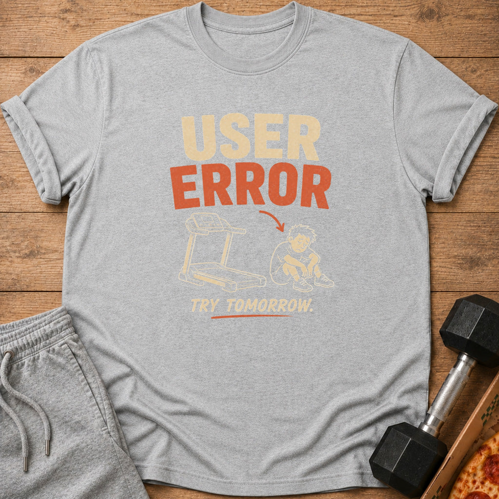 Gray t-shirt with "USER ERROR" text, treadmill, and a sad figure.