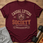 Maroon t-shirt with "Casual Lifters Society" and a sloth lifting weights.