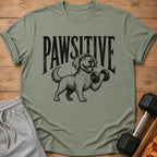 Green t-shirt with a dog lifting a dumbbell and the text "PAWSITIVE".