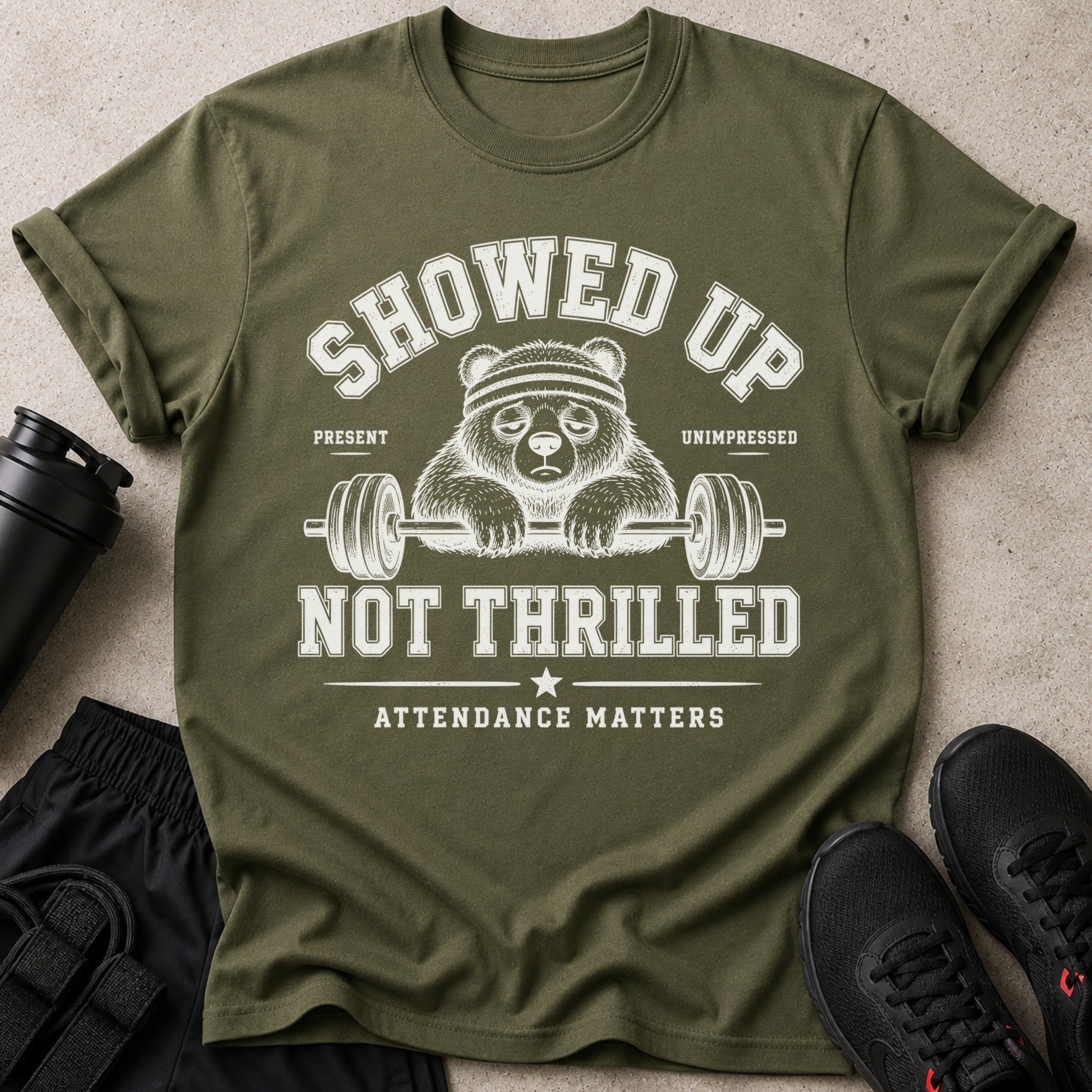 Olive green t-shirt with a panda lifting weights graphic and text.