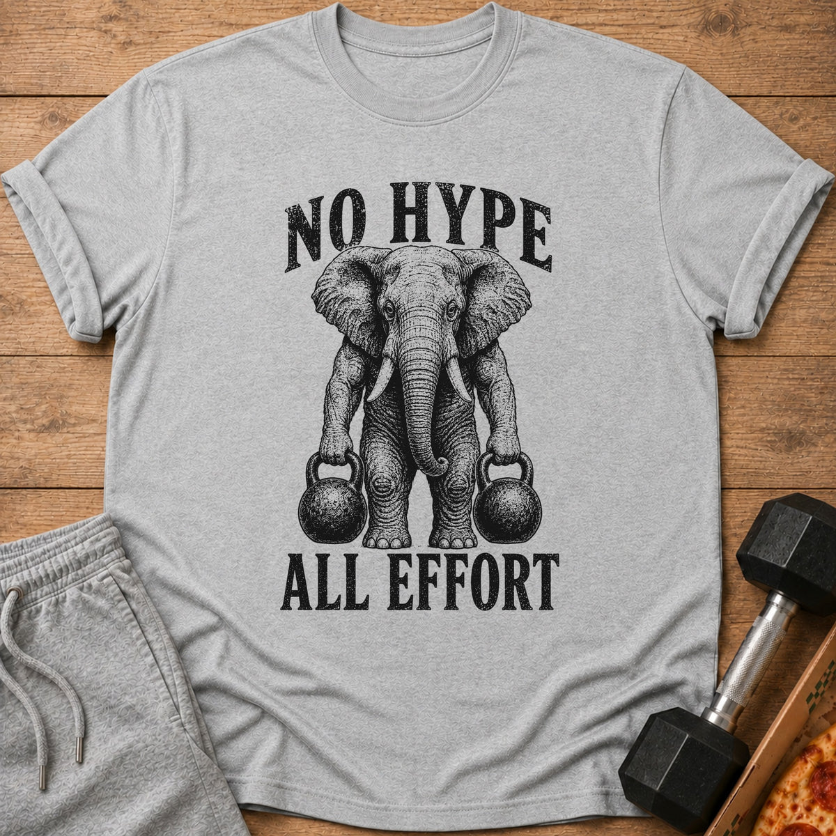 Gray t-shirt with an elephant lifting kettlebells, text reads "NO HYPE ALL EFFORT".