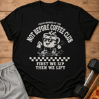 Black t-shirt with graphic: "Proud member of the Not Before Coffee Club. First we sip, then we lift."