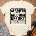 Cream t-shirt with "APPROVED FOR MEDIUM EFFORT" text and inspection details.