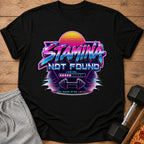 Black t-shirt graphic with retro text "STAMINA NOT FOUND LOADING..." and dumbbells.