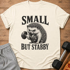 T-shirt with a hedgehog lifting a dumbbell and text "SMALL BUT STABBY".