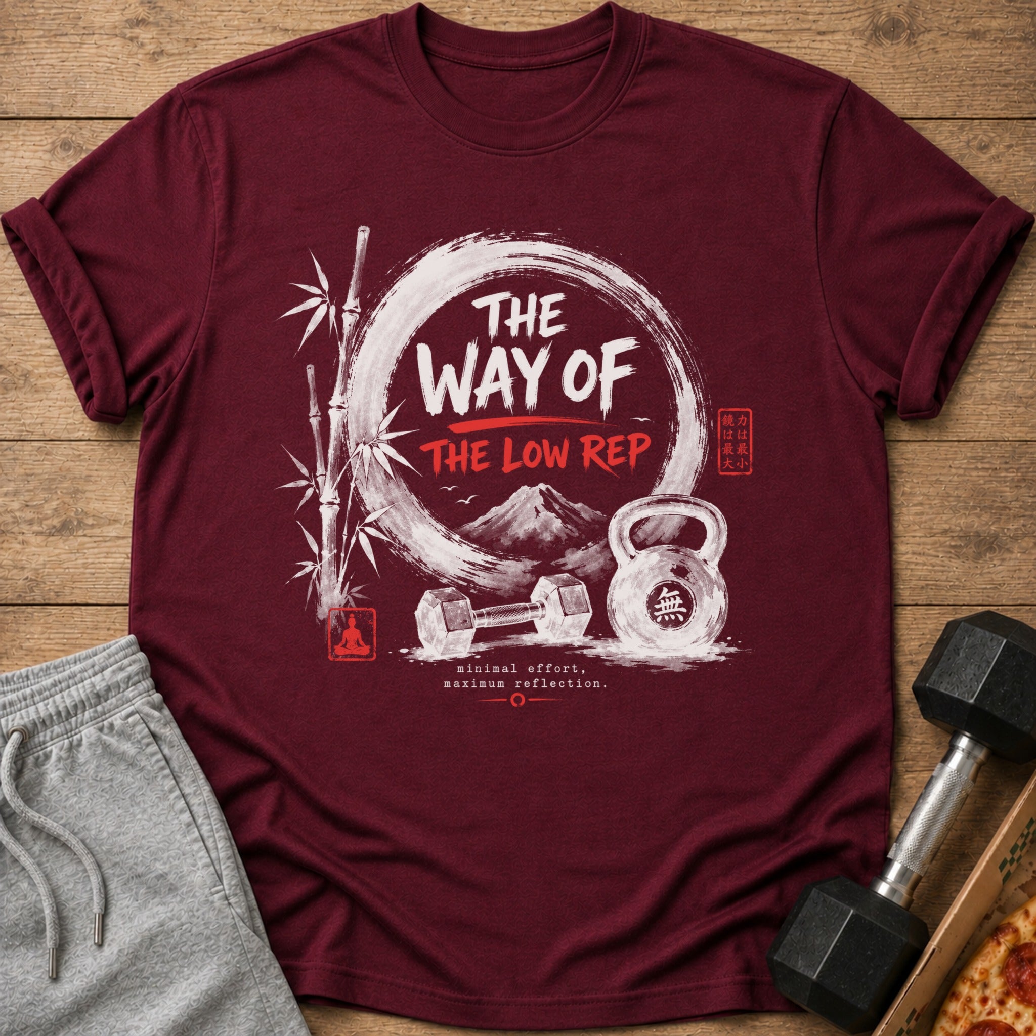 Maroon t-shirt with "The Way of The Low Rep" design, bamboo, mountains, dumbbells, kettlebell.