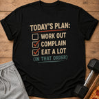 Black t-shirt with text "Today's Plan: Work Out, Complain, Eat a Lot (In That Order)".