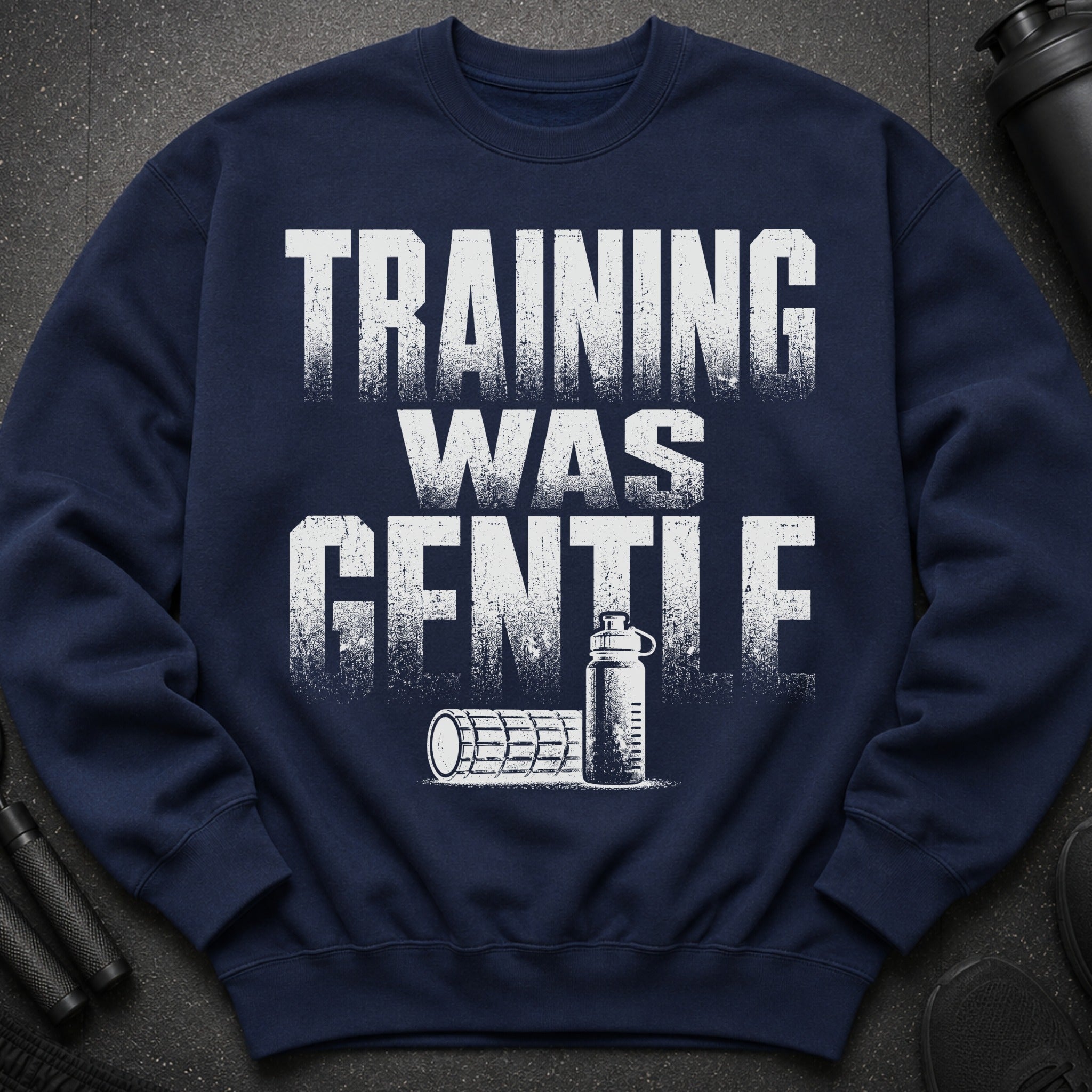 Navy sweatshirt with "TRAINING WAS GENTLE" text and workout imagery.
