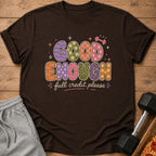 Brown t-shirt with "GOOD ENOUGH full credit please" text and dumbbell graphic.
