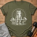 White line art of a cat wearing a headband lifting a barbell, with stars and sun rays.