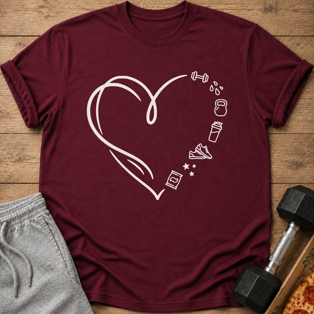 Maroon t-shirt with white heart outline and fitness icons: dumbbell, kettlebell, shaker, shoes, and snack.
