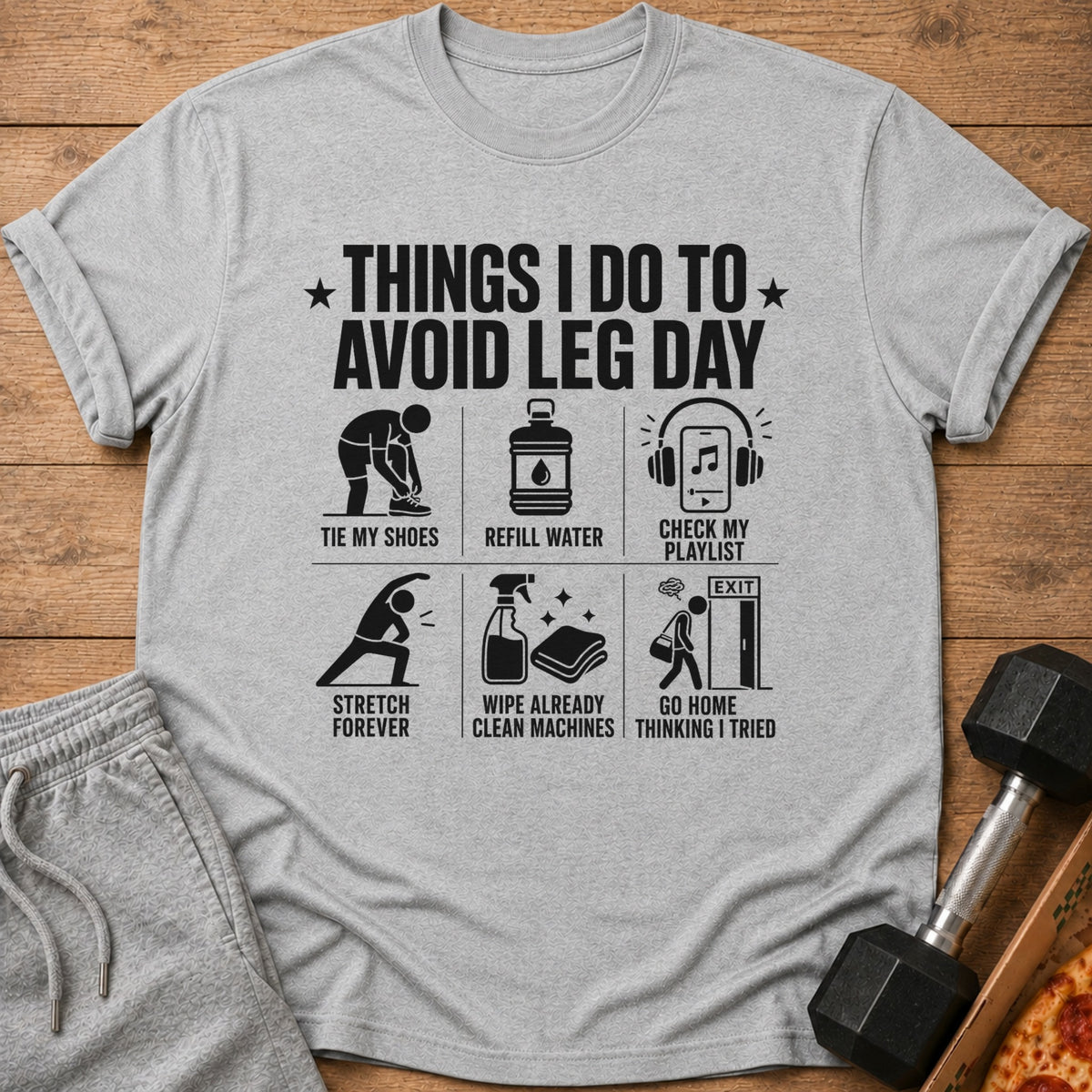 Grey t-shirt with "Things I Do To Avoid Leg Day" and six humorous workout icons.