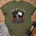 Olive green t-shirt with "EVERY DAY IS LEG DAY" graphic, skeleton hand holding tattered flag over weight plates.