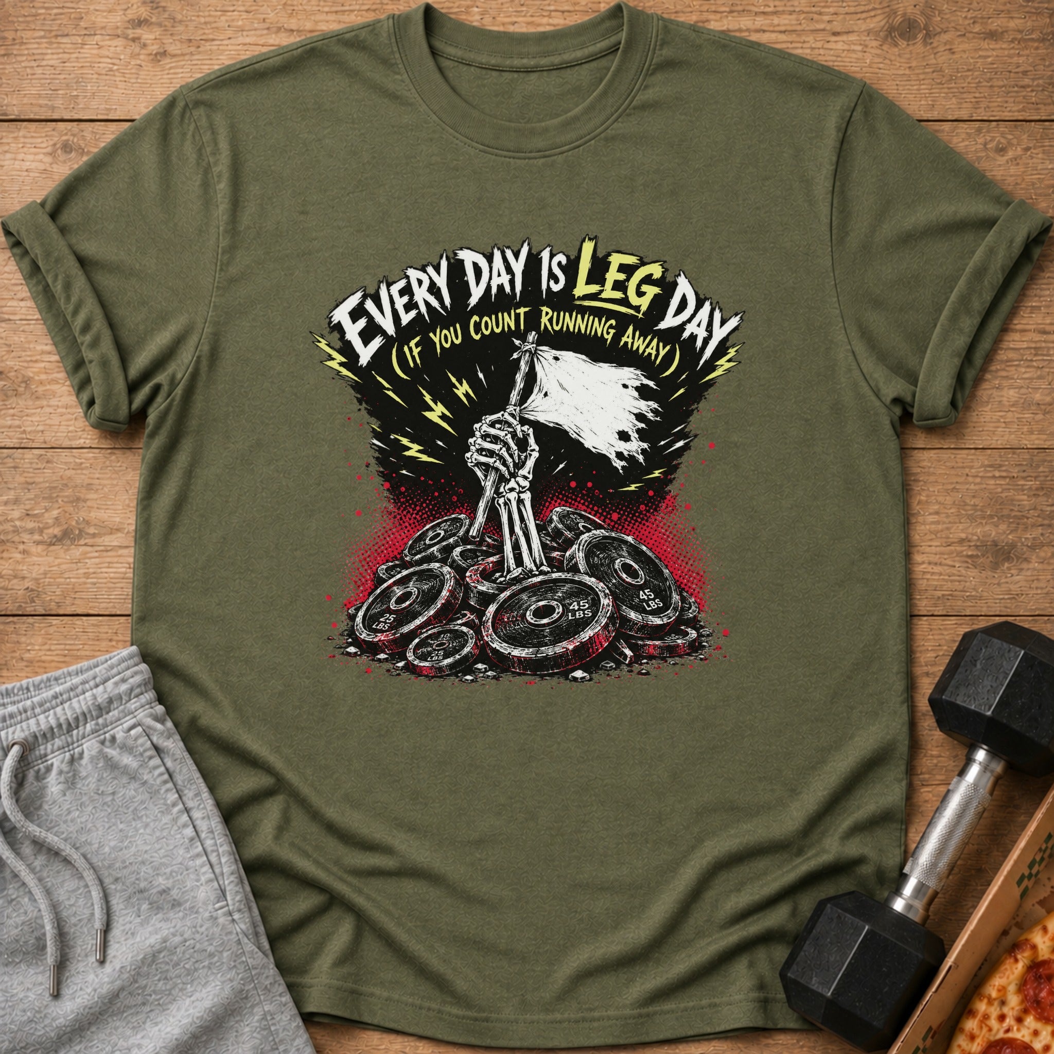 Olive green t-shirt with "EVERY DAY IS LEG DAY" graphic, skeleton hand holding tattered flag over weight plates.