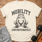 T-shirt with a distressed graphic of a frog holding dumbbells and the text MOBILITY UNFORTUNATELY.