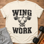 Cream t-shirt with distressed graphic of a duck lifting weights, text "WING WORK".