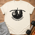 Black sloth hanging from a pull-up bar with text "Snooze Button Athlete".