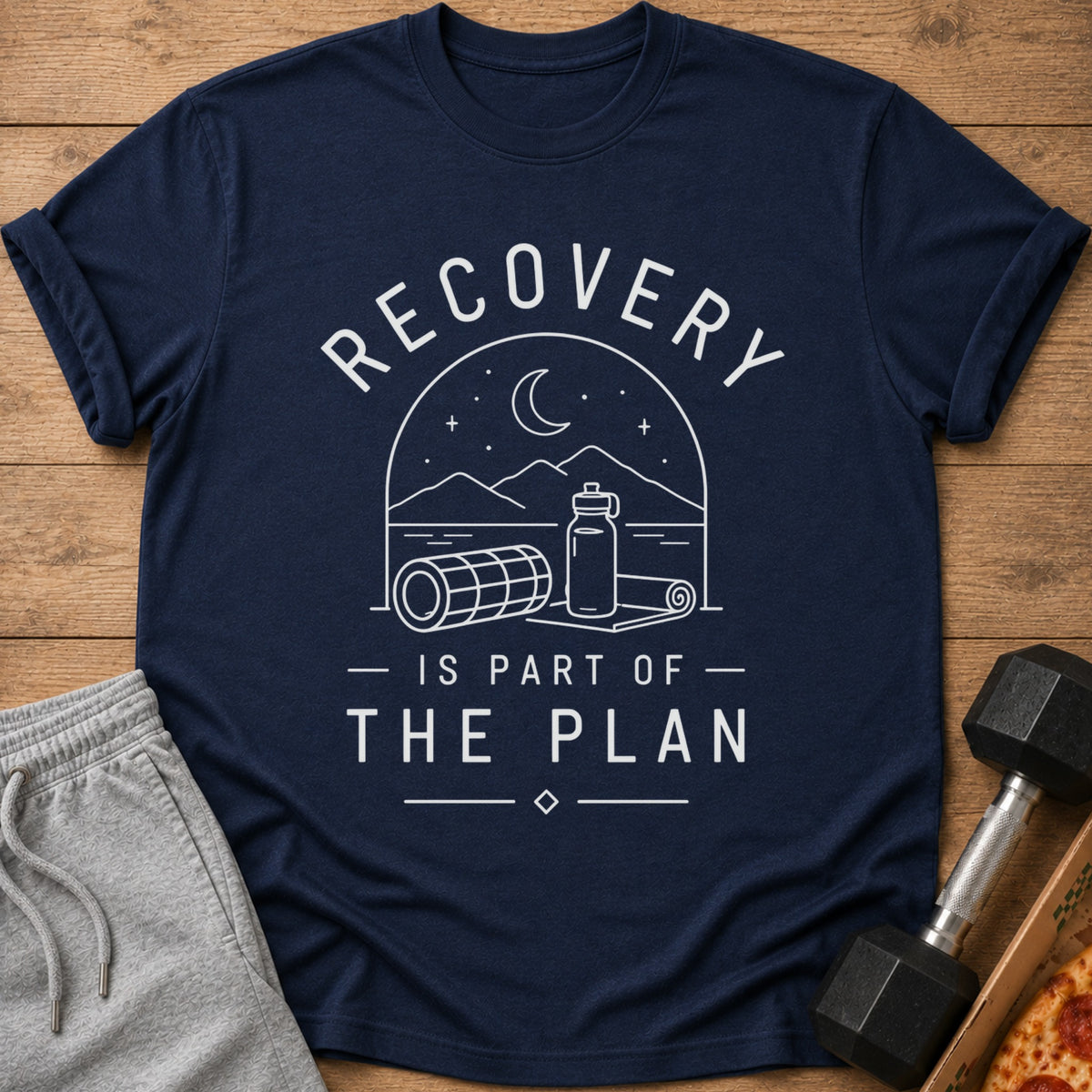 Navy t-shirt with "RECOVERY IS PART OF THE PLAN" graphic and workout imagery.