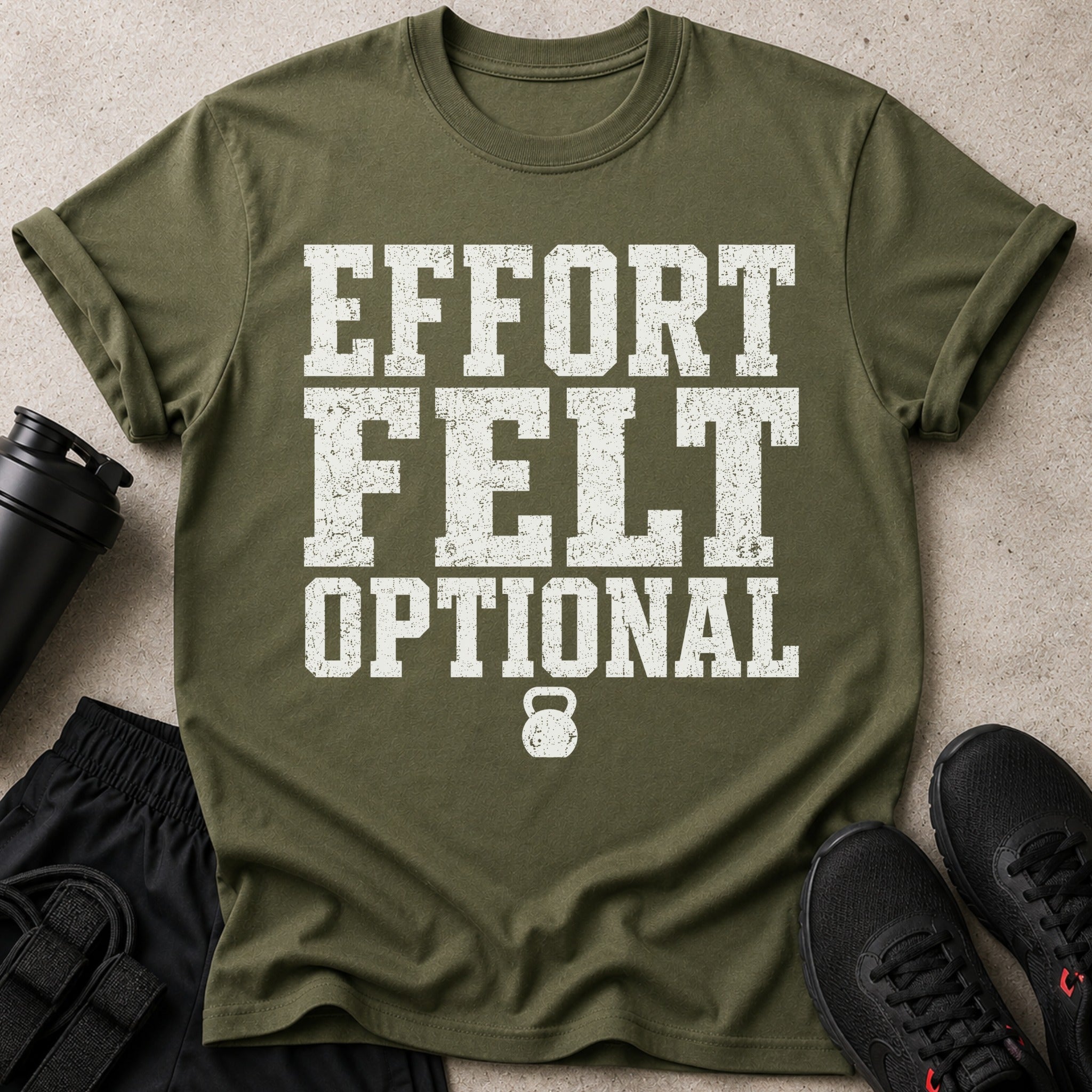 Olive green t-shirt with white distressed text: EFFORT FELT OPTIONAL