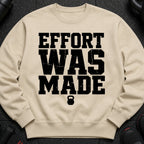 Tan sweatshirt with black text "EFFORT WAS MADE" and a kettlebell logo.