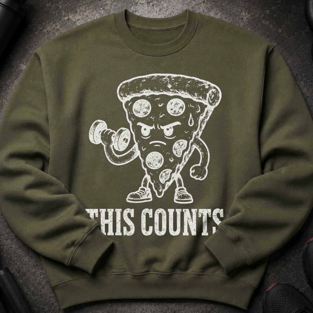Green sweatshirt with a cartoon pizza slice lifting weights and the text "THIS COUNTS".