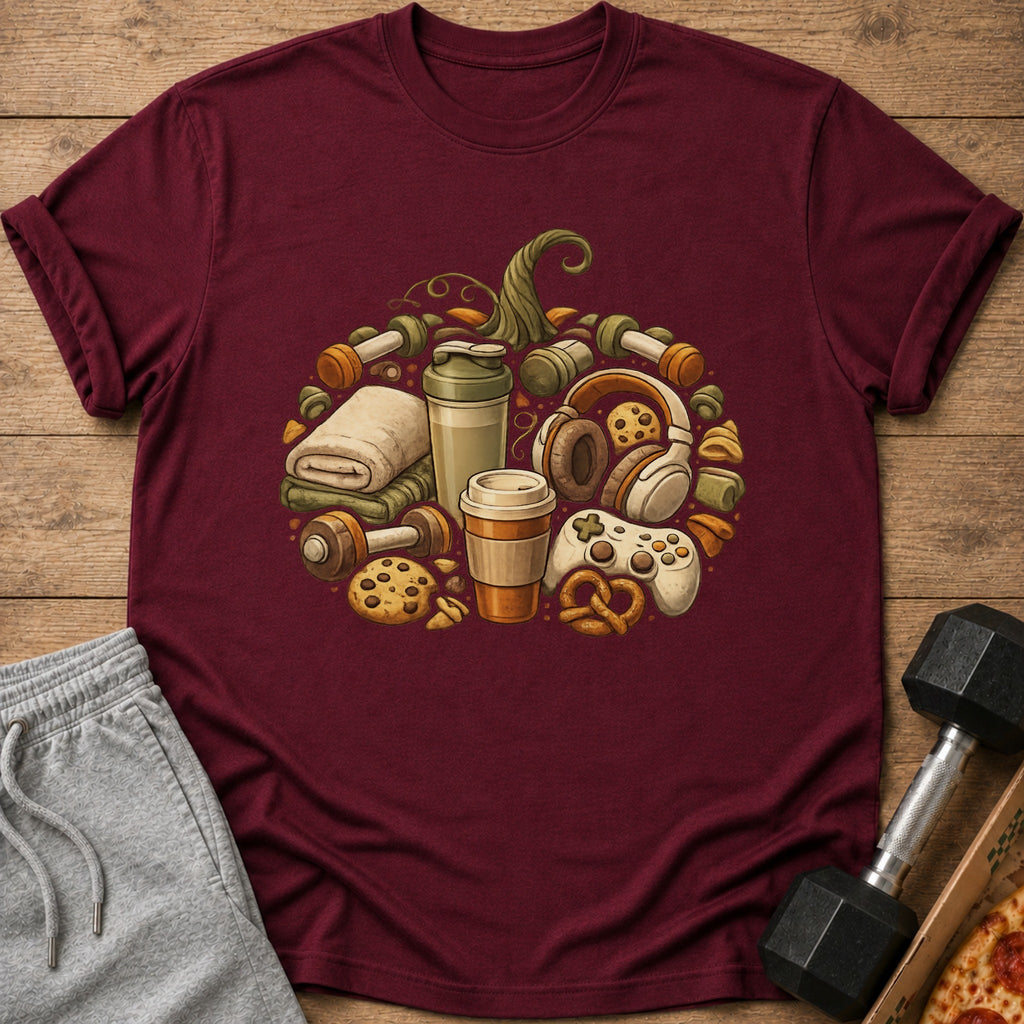 T-shirt with pumpkin design of gym weights, shaker, headphones, coffee, controller, and cookies.