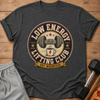 Dumbbell with sad face above coffee cup, text "Low Energy Lifting Club Est. Whenever".