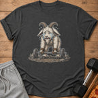T-shirt graphic of a crying goat lifting a barbell with dumbbells and pizza nearby.