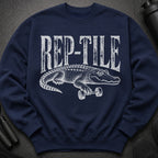 Navy sweatshirt with white graphic of alligator holding dumbbell and text "REP-TILE".