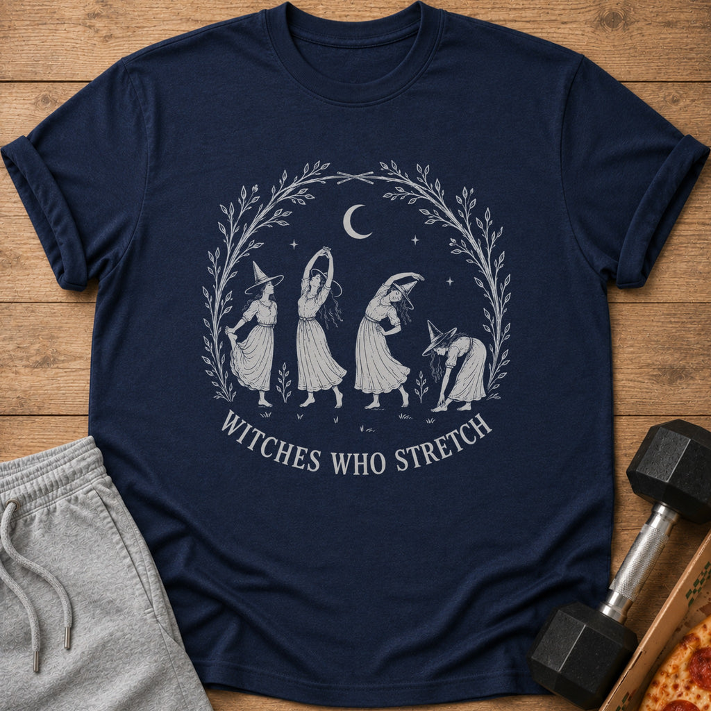 Navy t-shirt with "Witches Who Stretch" text and illustration of witches stretching.