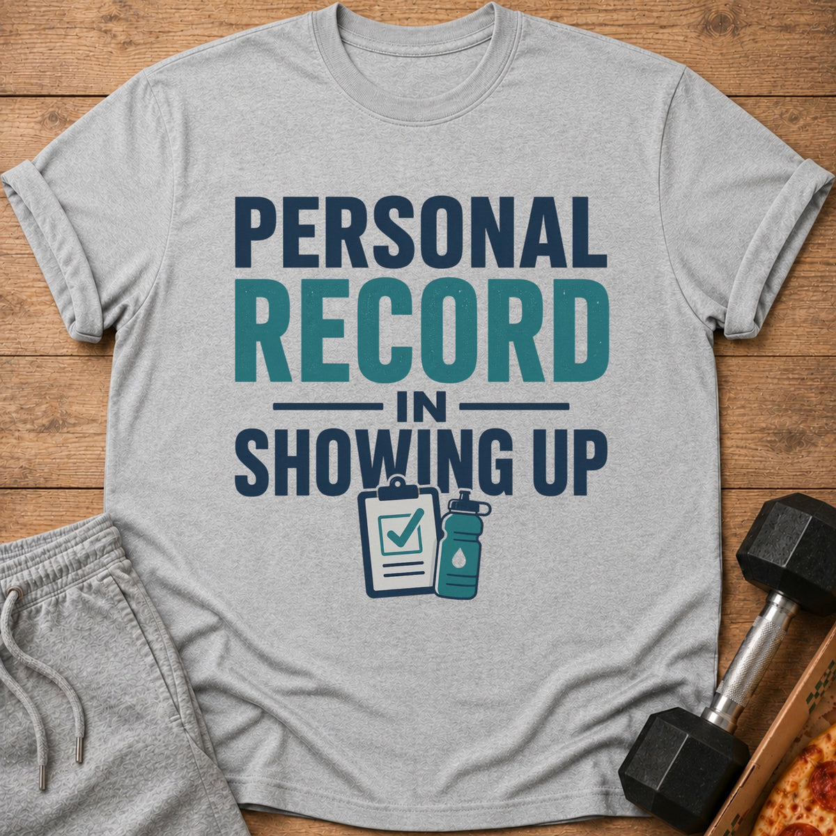 Gray t-shirt with "Personal Record in Showing Up" text and fitness icons.