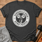 Dark gray t-shirt with a white circular graphic: arm lifting a dumbbell, text "DUMBBELLS OVER DUMB PEOPLE".