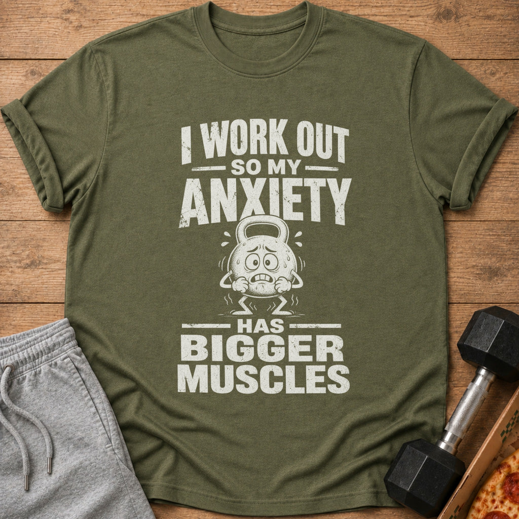 Olive green t-shirt with white text: "I WORK OUT SO MY ANXIETY HAS BIGGER MUSCLES".