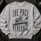 Grey sweatshirt with distressed graphic of a turtle on a treadmill, text reads "THE PACE IS PERSONAL".