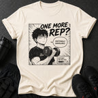 Cream t-shirt with anime graphic: "One More Rep?" and man holding 15kg dumbbell.
