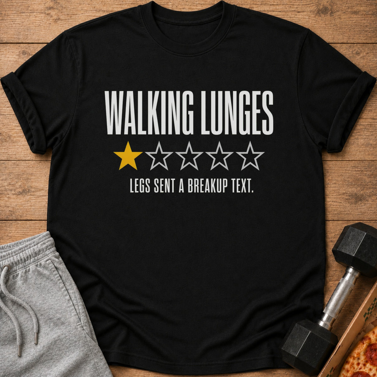 Black t-shirt with "WALKING LUNGES 1/5 Stars: LEGS SENT A BREAKUP TEXT."