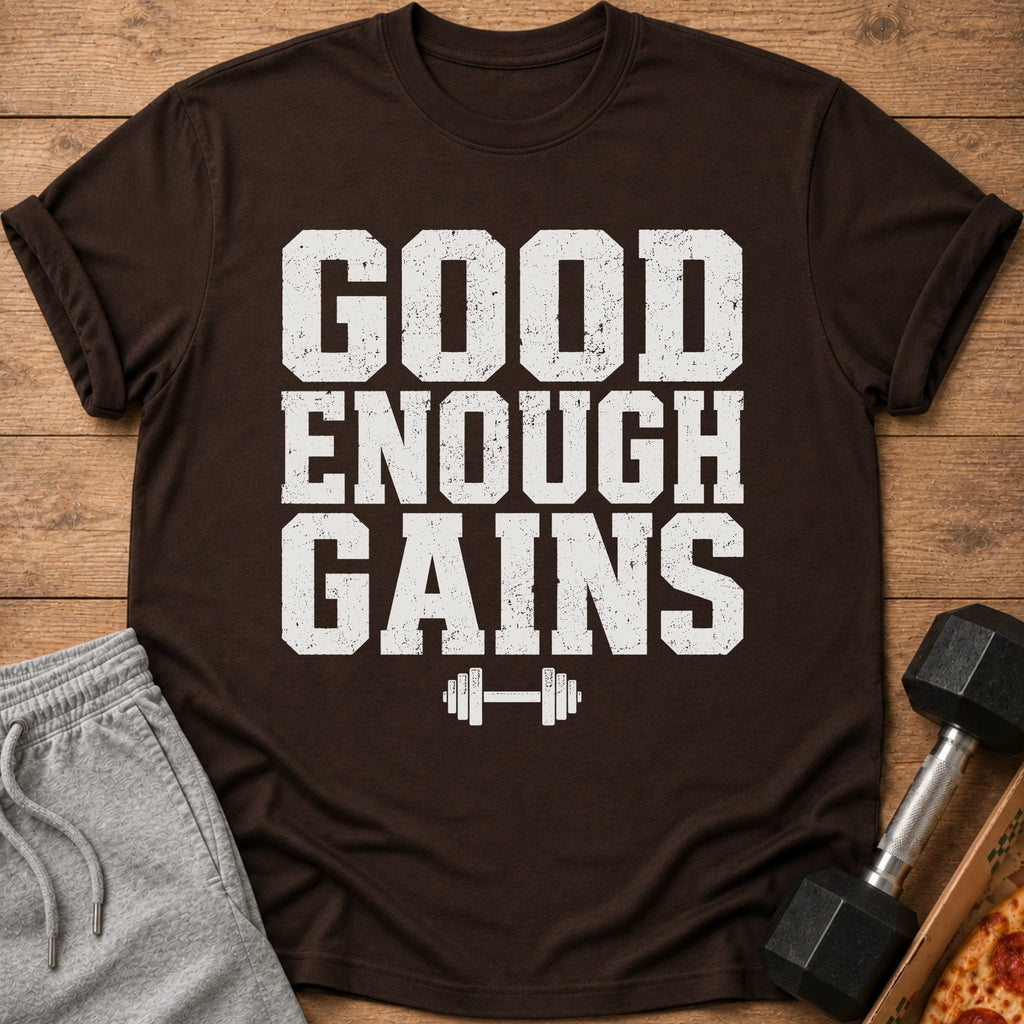 Brown t-shirt with white text "GOOD ENOUGH GAINS" and dumbbell graphic.