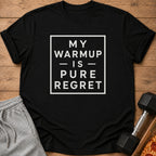 Black t-shirt with white text "MY WARMUP IS PURE REGRET" inside a box.