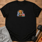 Black t-shirt with a cartoon capybara holding a dumbbell and eating a donut.