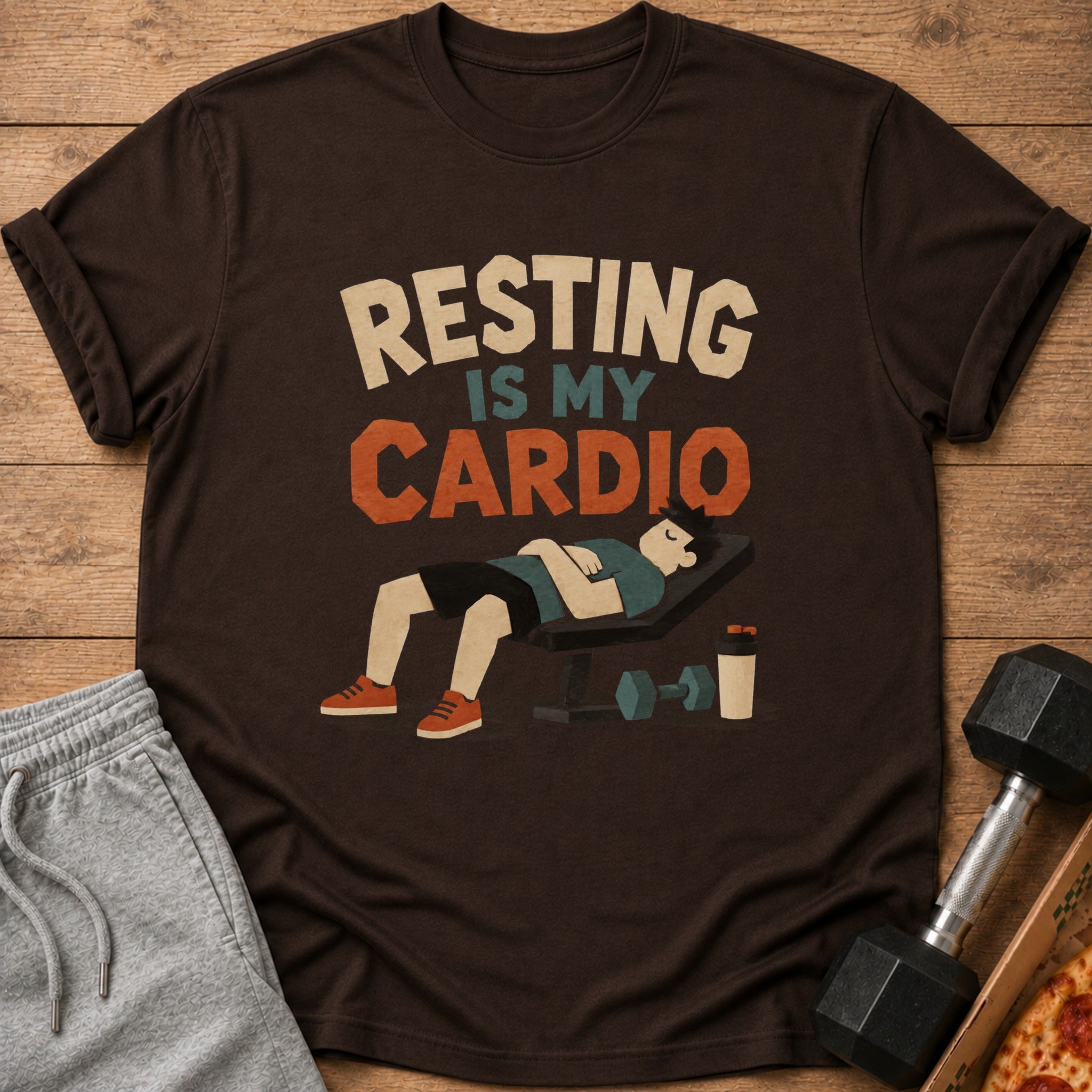 T-shirt with "Resting is my cardio" text and sleeping person on bench.