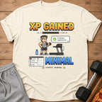 Pixel art t-shirt graphic "XP Gained" with character, treadmill, and stats.