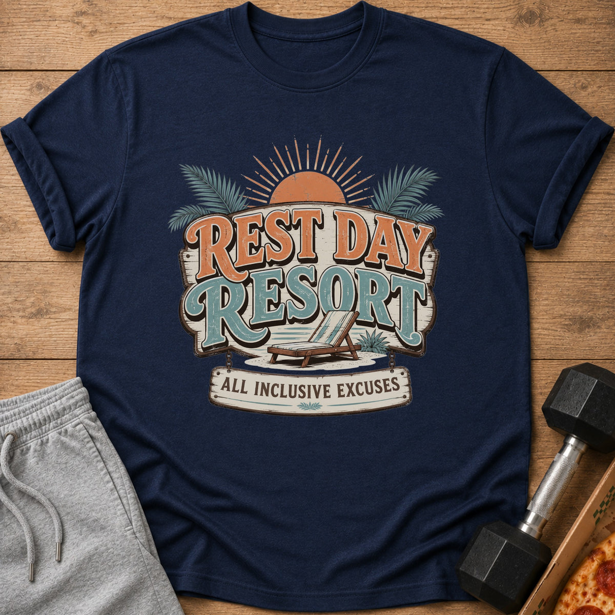Navy t-shirt with "REST DAY RESORT" and "ALL INCLUSIVE EXCUSES" graphic.