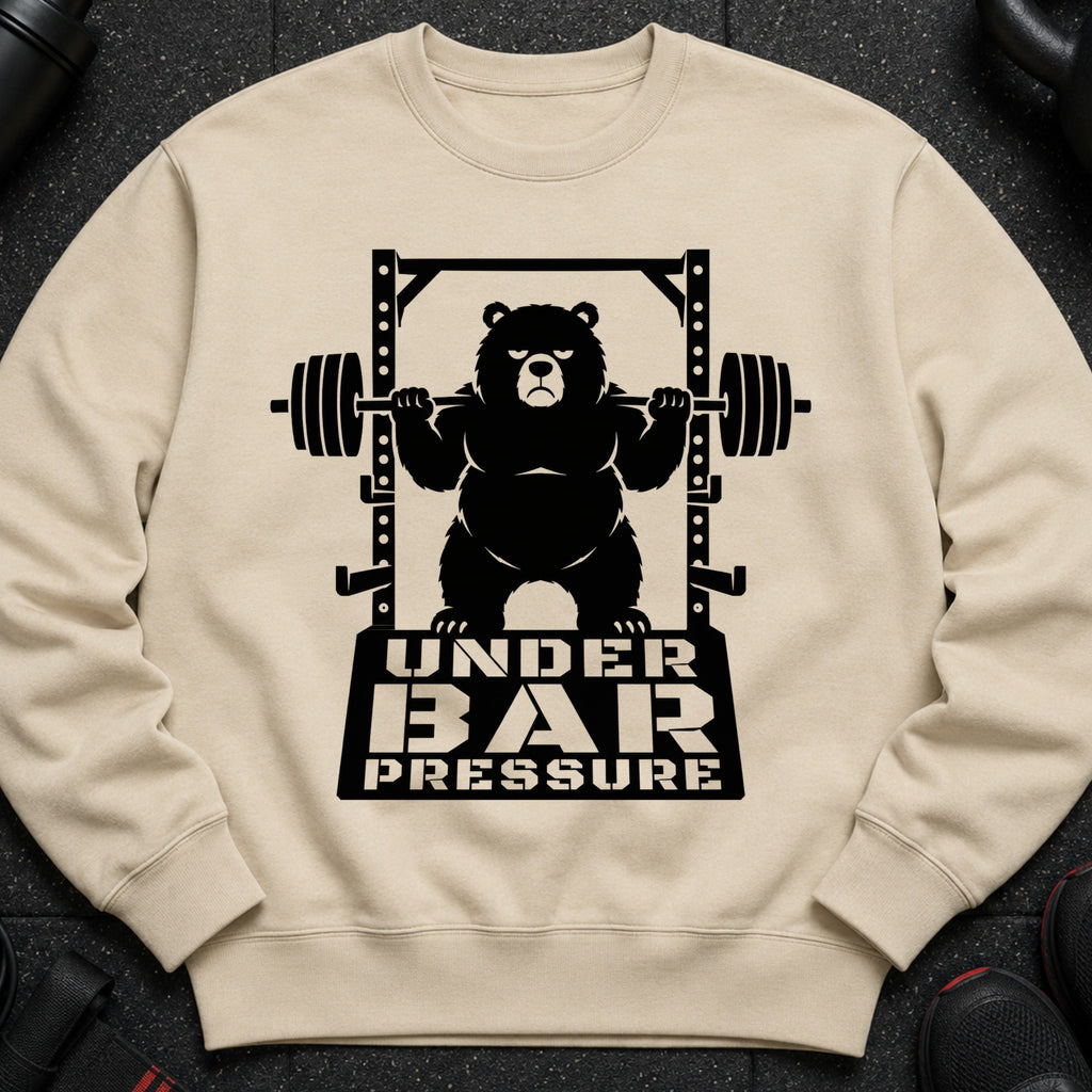 Black bear lifting barbell under gym rack with text "UNDER BAR PRESSURE"