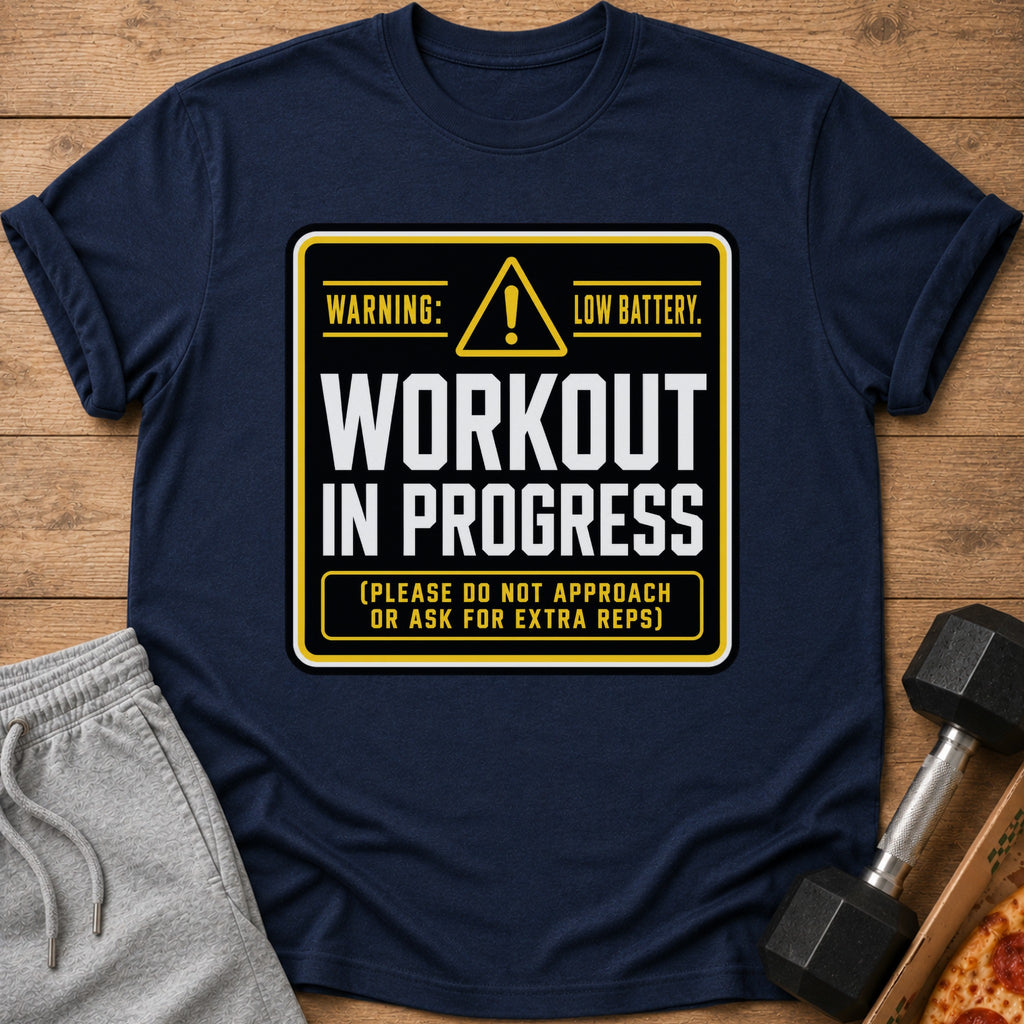 Dark navy t-shirt with "Workout In Progress: Low Battery" text and warning symbol.