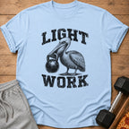 Light Work graphic on light blue t-shirt with pelican holding kettlebell.
