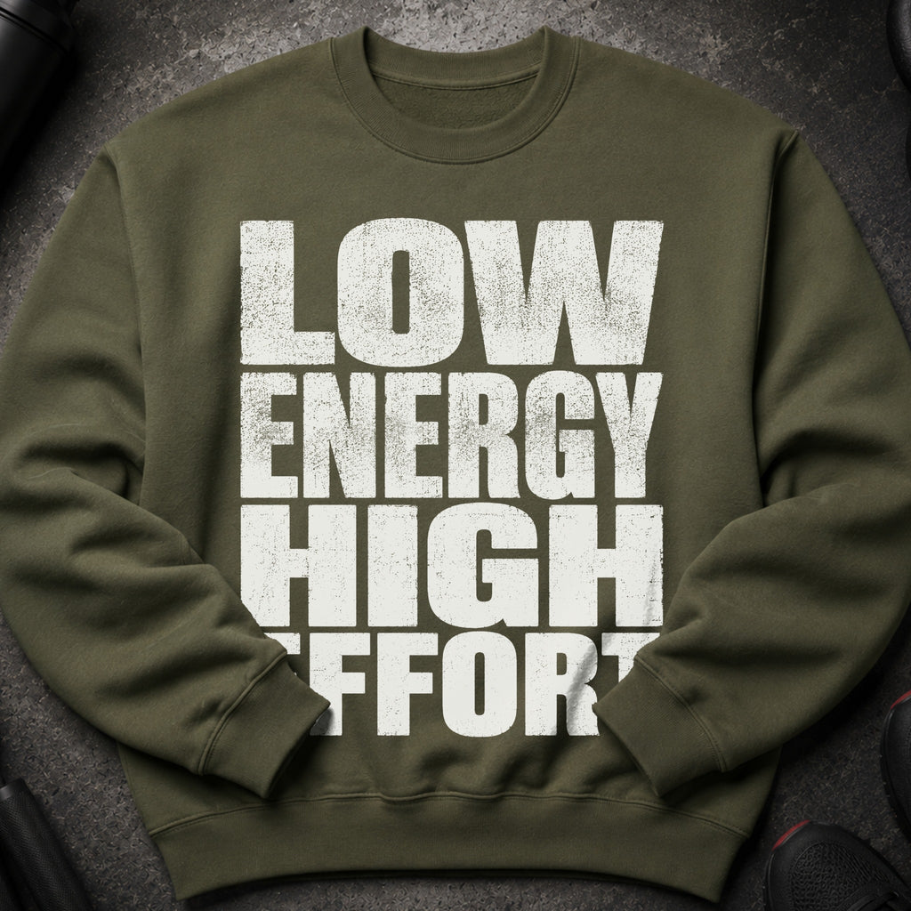 Olive green sweatshirt with white distressed text "LOW ENERGY HIGH EFFORT".