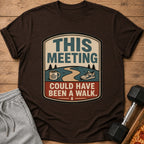 T-shirt graphic with text "This Meeting Could Have Been A Walk."